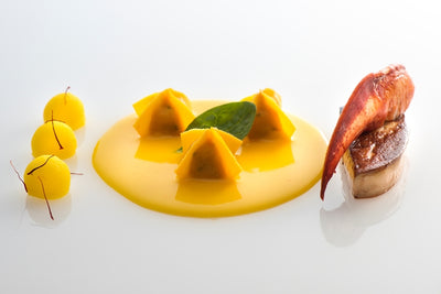 Ravioli with lobster, foie gras, potatoes and saffron